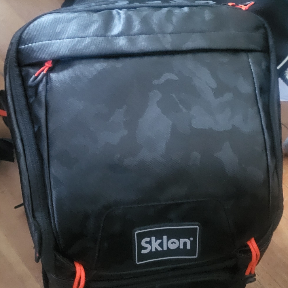 SkLO Black Backpack with Structured Design and Durable Material